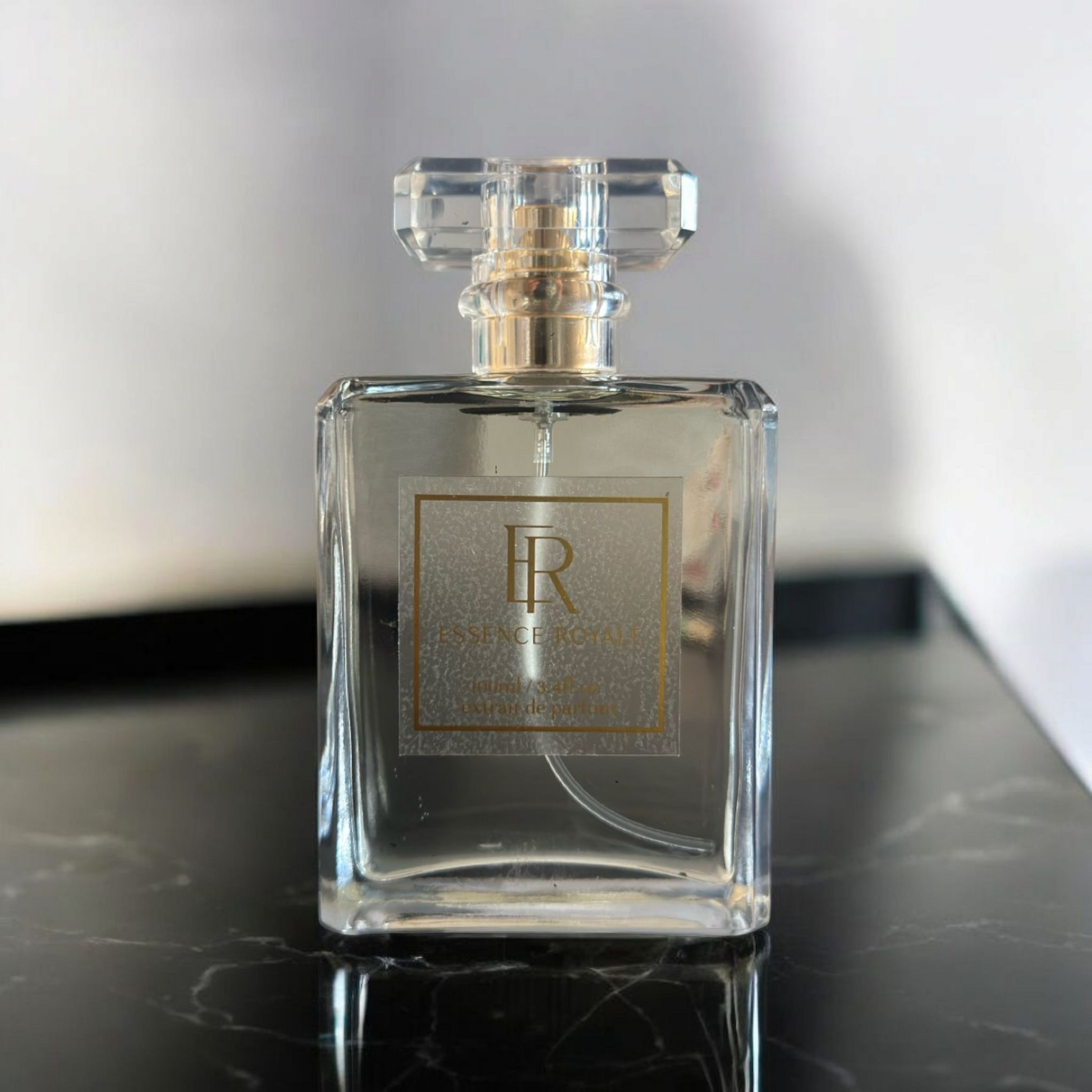 Truth fragrance bottle surrounded by notes of cardamom, cedarwood, and coumarin